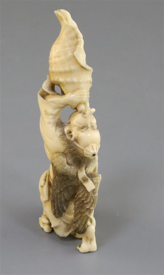 A Japanese ivory okimono of a Yamabushi Tengu, Meiji period, H. 11.8cm